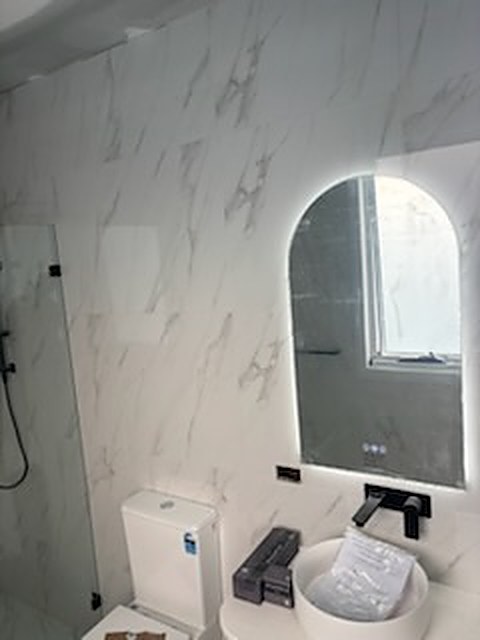 LED mirror in a renovated bathroom